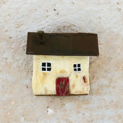 Casita tradicional tallada en madera: Arriero