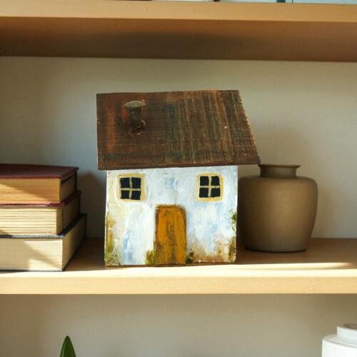 Casita tradicional tallada en madera: Guadual