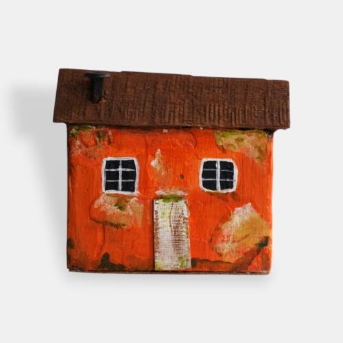 Casita tradicional tallada en madera: Inspiración